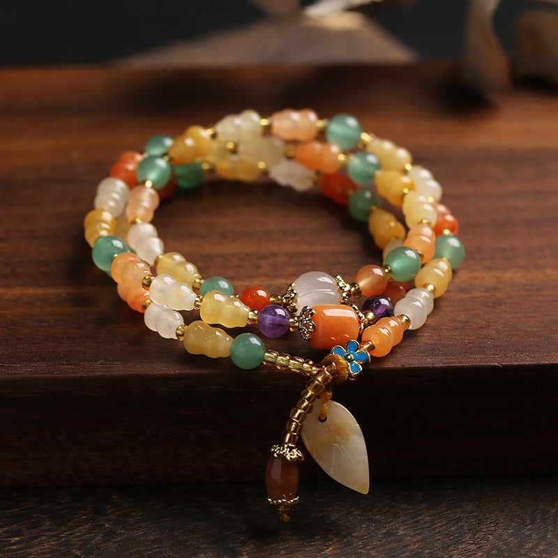 Pulsera de la riqueza con calabaza de jade y seda dorada Mythstone 