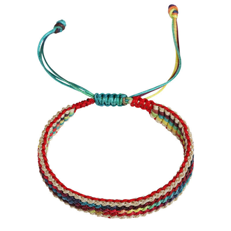 Pulsera trenzada de protección multicolor hecha a mano con piedra mítica del Tíbet