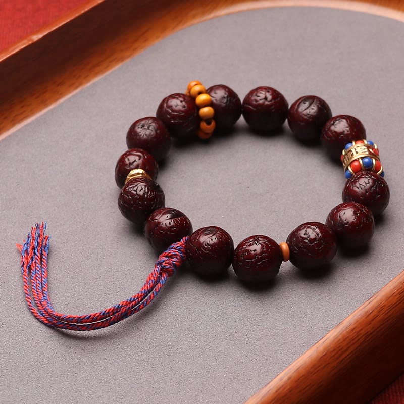 Pulsera de borlas con cuentas de semillas Bodhi de Mythstone y paz y calma