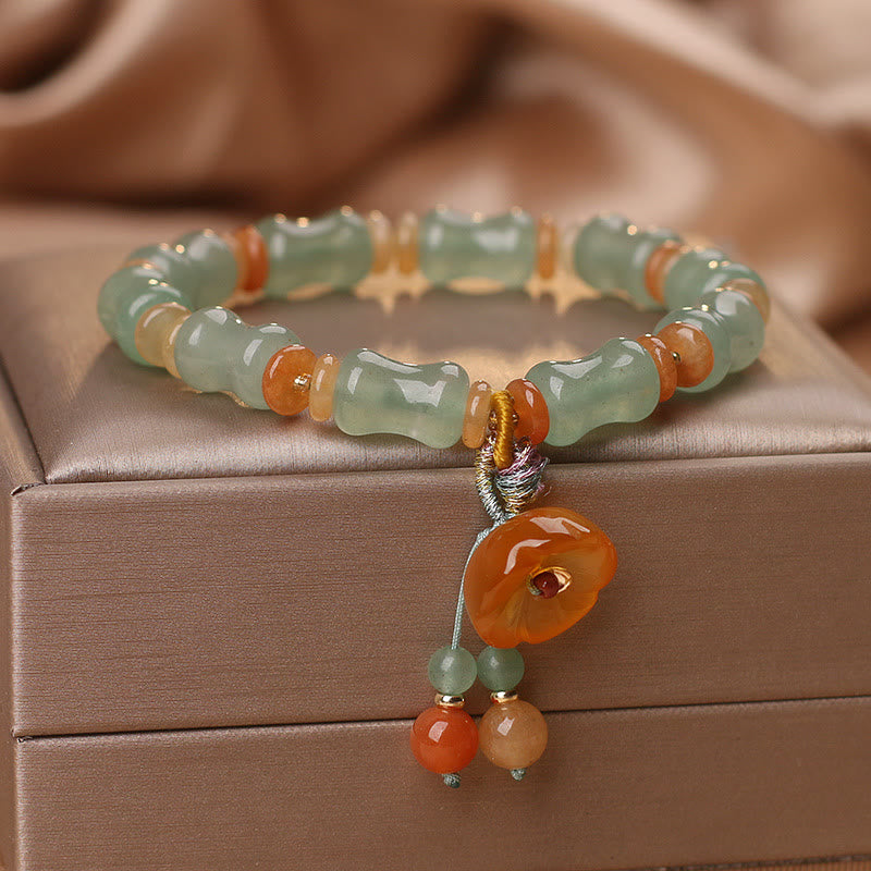 Pulsera de la suerte con diseño de flor de bambú y jade natural de Mythstone