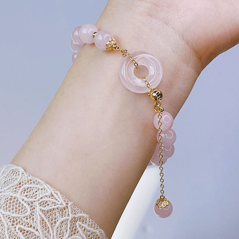 Pulsera con dije de amor y hebilla de paz de cristal rosa natural Mythstone