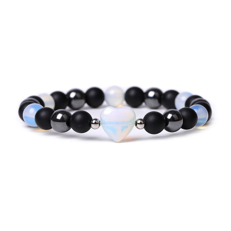 Pulsera de protección con corazón de amor y cristal de ojo de tigre y ónix negro Mythstone 