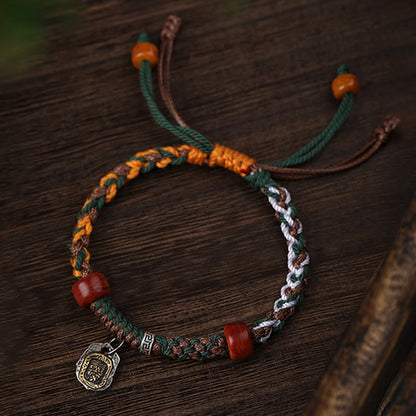 Pulsera trenzada de protección con hueso de camello de la diosa de la riqueza Zakiram de plata de ley 925 tibetana hecha a mano de Mythstone 