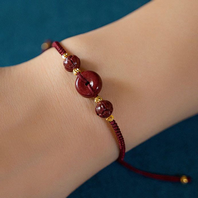 Pulsera trenzada con bendición y hebilla de paz de cinabrio de loto hecha a mano de Mythstone