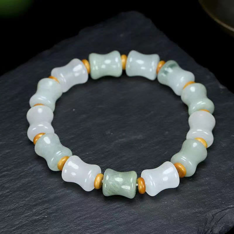 Pulsera de la suerte de la abundancia con diseño de cáscara de coco y bambú de jade Mythstone