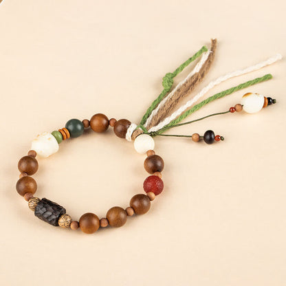 Pulsera con borlas de protección de la buena suerte con forma de garra de gato y semilla de Bodhi de madera con rayo de Mythstone