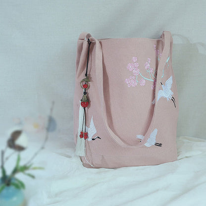 Bolso de mano de lona de gran capacidad con bordado de flores de ciruelo y grulla de Mythstone