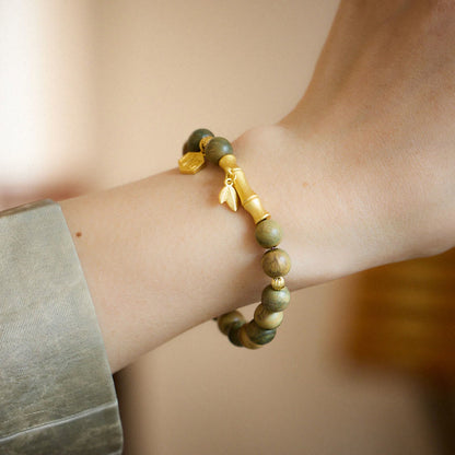 Pulsera relajante de bambú con personaje Fu de sándalo verde Mythstone