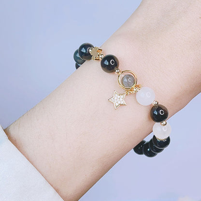 Pulsera de protección con forma de corazón, estrella y flor de obsidiana con brillo de plata natural Mythstone