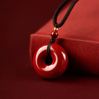 Colgante de collar con hebilla de paz y bendición de la calma de Mythstone Cinnabar