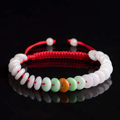 Pulsera tejida con hilo rojo de la suerte y jade redondo Mythstone