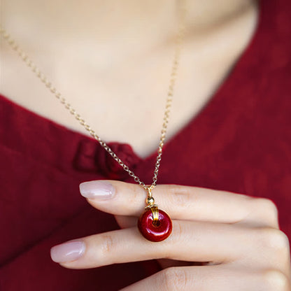 Colgante de collar con hebilla de paz y bendición de la calma de Mythstone Cinnabar