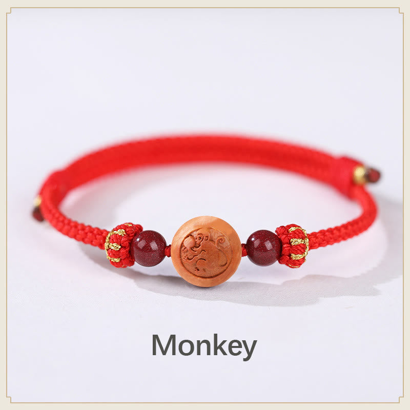 Mythstone Natural Peach Wood Chinese Zodiac Fu Character Carved Cinnabar Wealth Bracelet