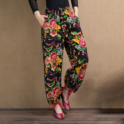 Pantalones harén con estampado de flores rojas y verdes de estilo étnico Mythstone y bolsillos 