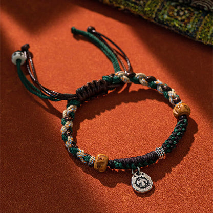 Pulsera de cuerda de la riqueza con cuentas tibetanas Dzi y hueso de yak de ágata