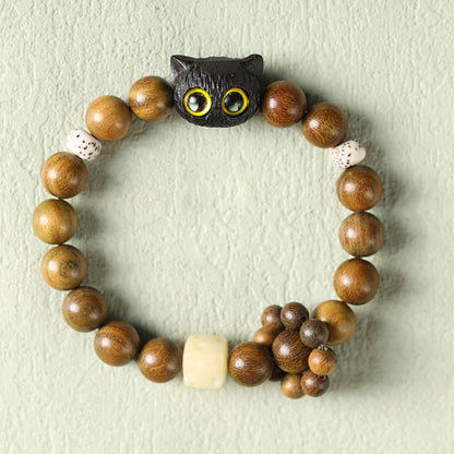 Pulsera relajante de madera de ébano y sándalo verde con diseño de gato y piedra mitológica 