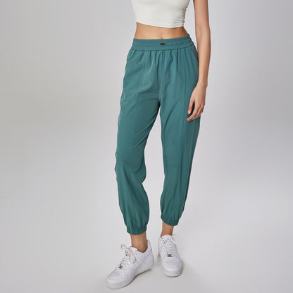 Pantalones deportivos de yoga y fitness de cintura alta Mythstone con bolsillos 