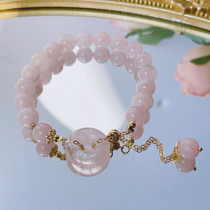 Pulsera con dije de amor y hebilla de paz de cristal rosa natural Mythstone