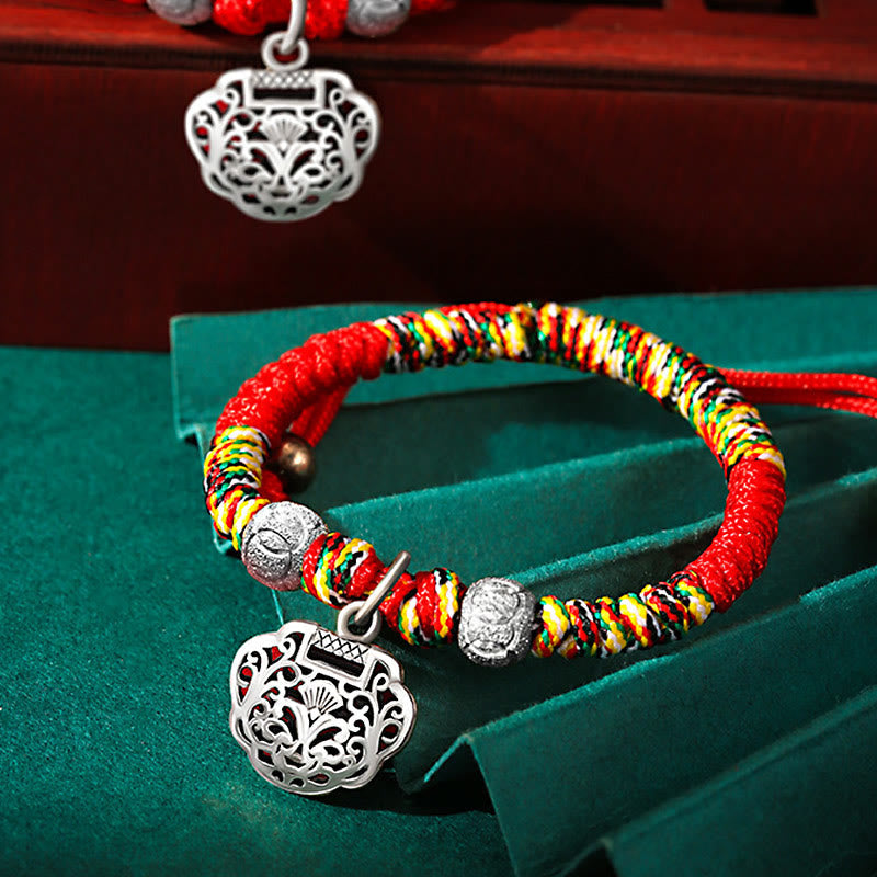 Pulsera trenzada hecha a mano para niños con dije de candado chino en plata de ley 925 de Mythstone con hilo rojo multicolor