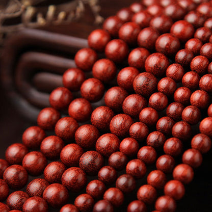 Pulsera de meditación con 108 cuentas de sándalo rojo y hojas pequeñas tibetanas Mythstone