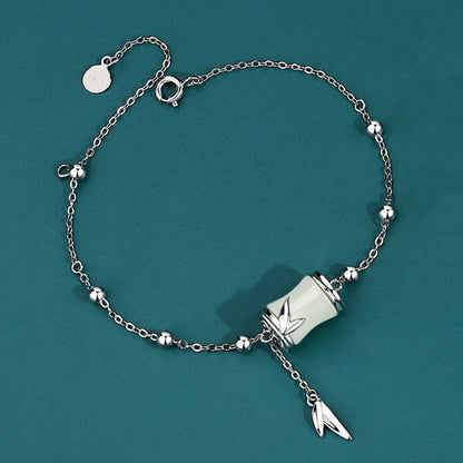 Pulsera con colgante de hoja de bambú y jade blanco hetiano en plata de ley 925 y oro de 22 quilates de Mythstone