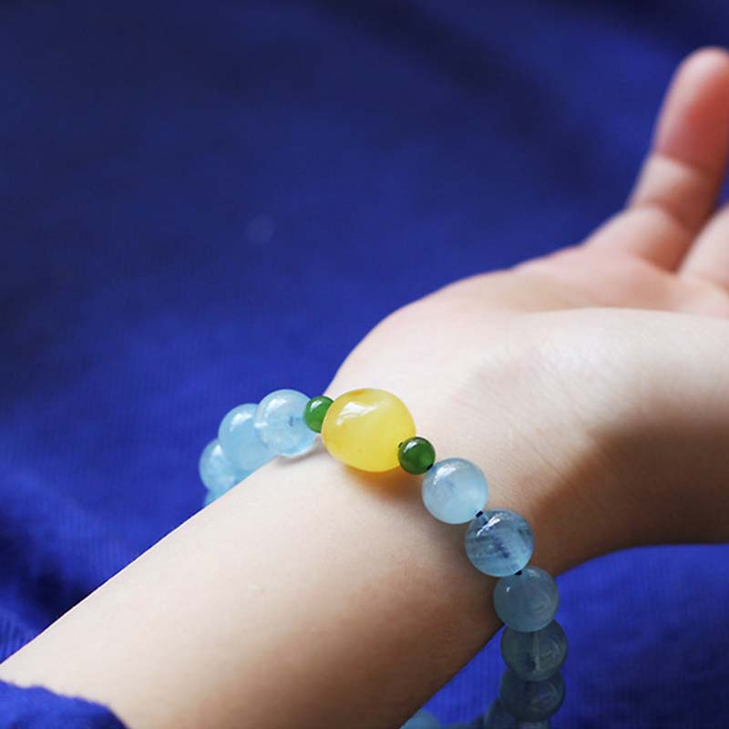 Pulsera curativa Serenity con cuentas de ámbar y aguamarina natural