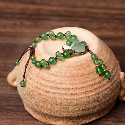 Pulsera de jade verde natural con flor colgante y suerte de Mythstone