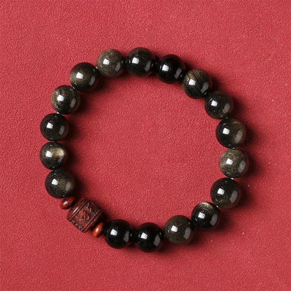 Pulsera curativa con personaje Om Mani Padme Hum Fu y obsidiana arcoíris con brillo dorado natural de Mythstone 