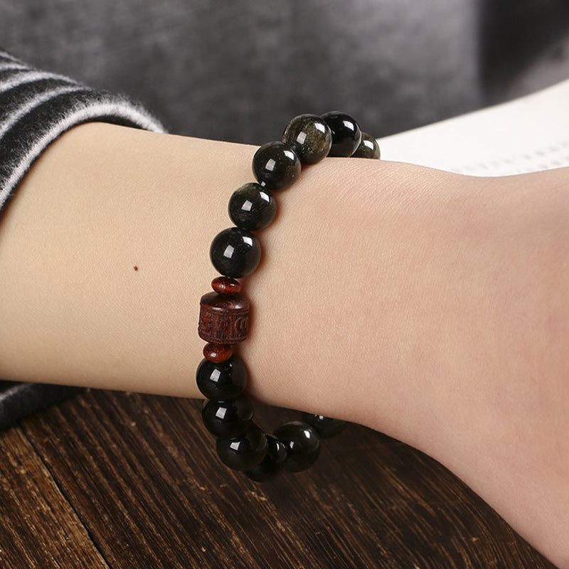 Pulsera curativa con personaje Om Mani Padme Hum Fu y obsidiana arcoíris con brillo dorado natural de Mythstone 