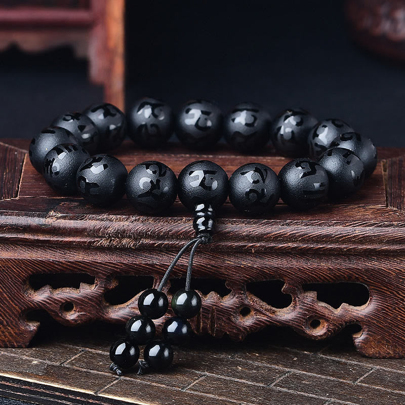 Pulsera de meditación Om Mani Padme Hum de ónix negro y cristal blanco del Tíbet Mythstone