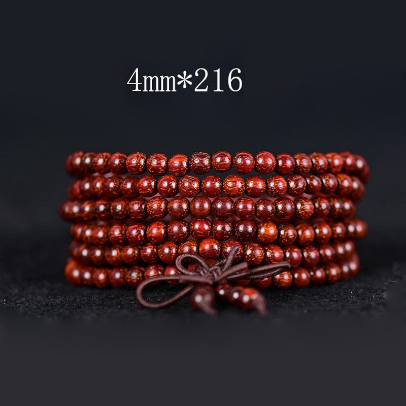 Pulsera de equilibrio de sándalo rojo con hojas pequeñas tibetanas de MythStone 