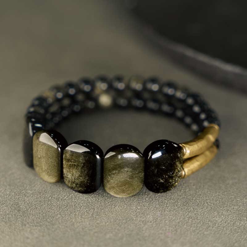 Pulsera reforzada con obsidiana negra y brillo dorado de Mythstone 