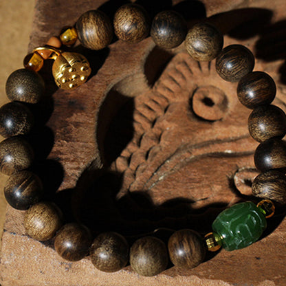 Mythstone 999 Gold Brunei Agarwood Cyan Jade Lotus Flower Peace Strength Bracelet