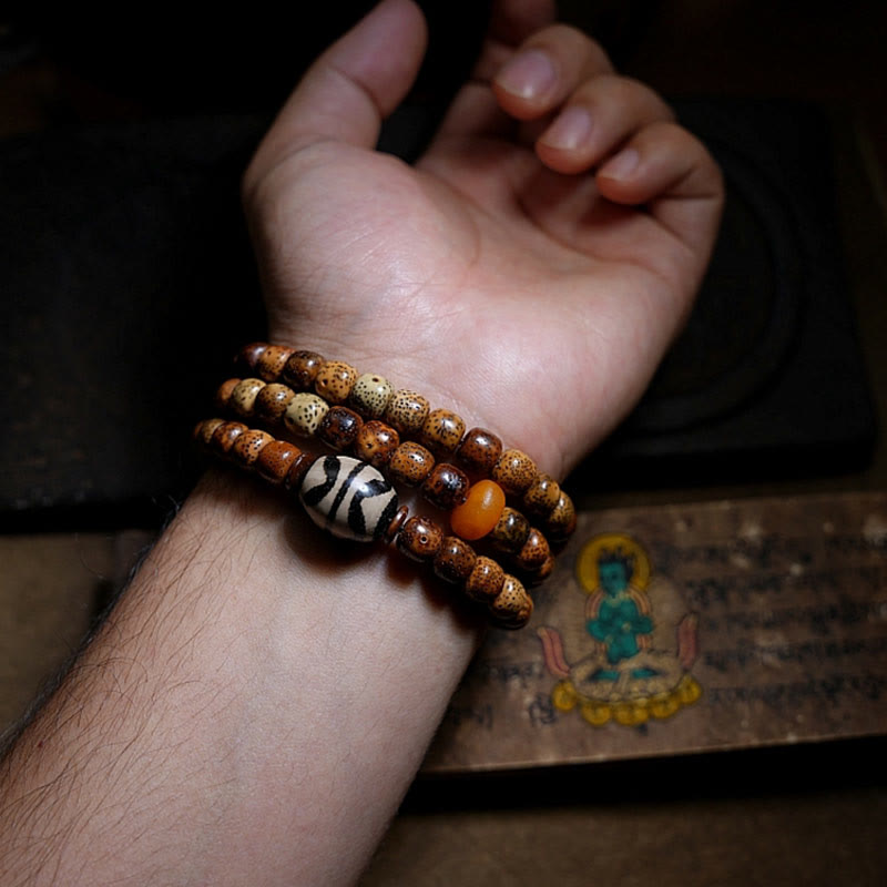 Pulsera de triple vuelta con cuentas de ámbar, dzi, semilla de Bodhi tibetano, ágata y zakiram, diosa de la riqueza