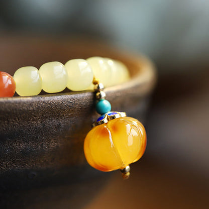 Pulsera de prosperidad con cristal de ágata roja, ámbar y calabaza de jade hetiano natural