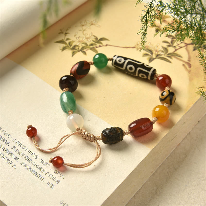 Pulsera de protección de riqueza de ágata con cuentas Dzi tibetanas de nueve ojos Mythstone 