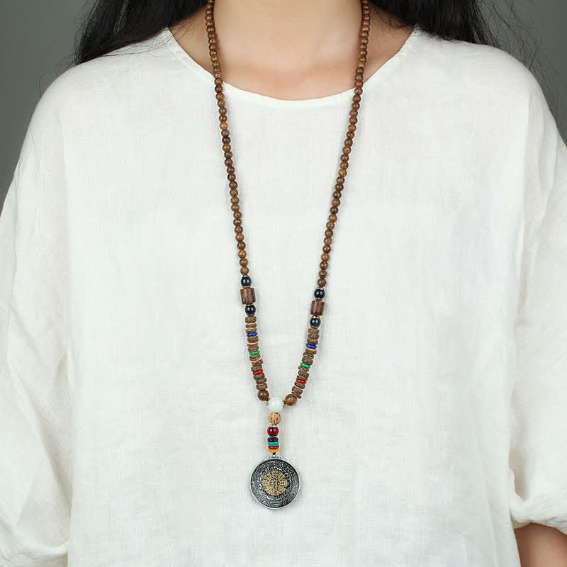 Collar con colgante de madera Vajra con rueda de oración tibetana Om Mani Padme Hum de Mythstone