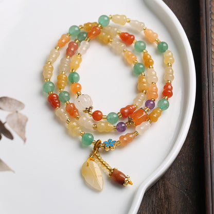 Pulsera de la riqueza con calabaza de jade y seda dorada Mythstone 