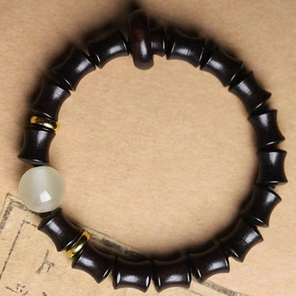 Pulsera de la paz de bambú, palo de rosa negro, sándalo verde y ébano de Mythstone