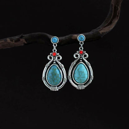 Pendientes colgantes con clip y diseño de gota de agua de turquesa vintage del Tíbet de Mythstone