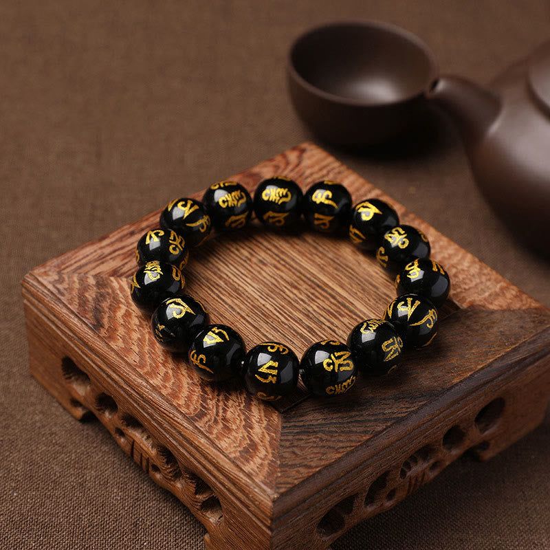 Pulsera de meditación Om Mani Padme Hum de ónix negro y cristal blanco del Tíbet Mythstone