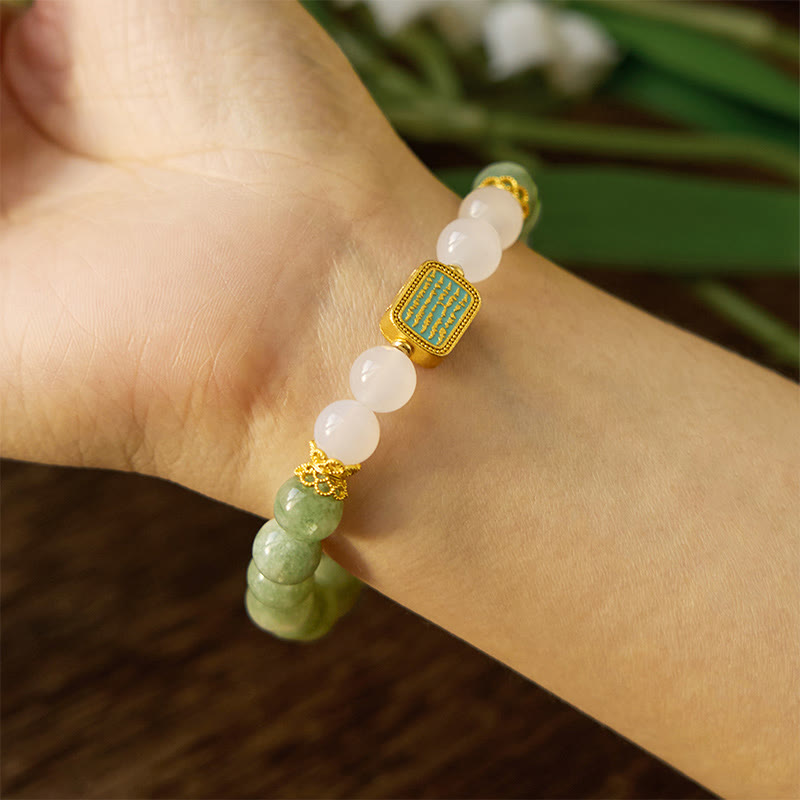 Pulsera de la abundancia de las cinco escrituras con jade verde natural y ágata blanca Mythstone 