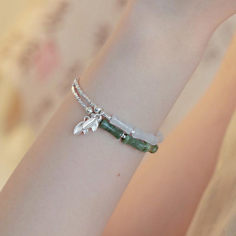 Pulsera de la suerte con diseño de bambú y peridoto en plata de ley 925 de Mythstone