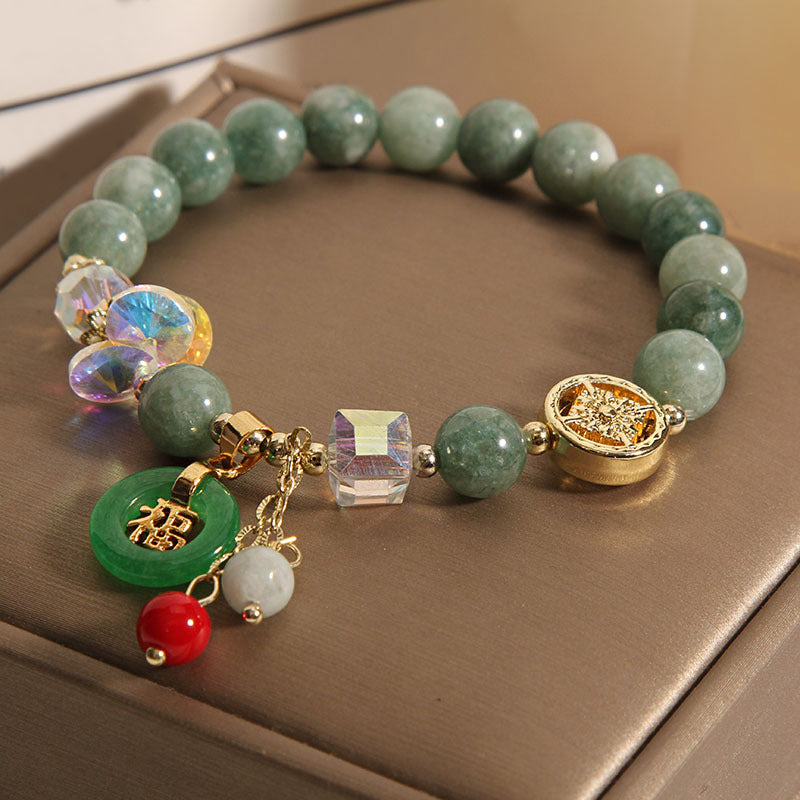 Pulsera curativa con dijes de personaje de jade y cuarzo fresa Mythstone 