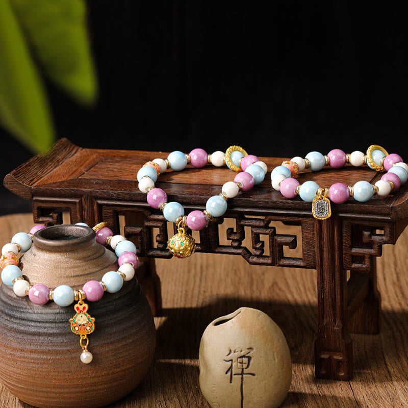 Pulsera de protección con cuentas de porcelana y ceniza de incienso de cristal de Liuli con cabeza de león y conejo, diosa de la riqueza tibetana Zakiram