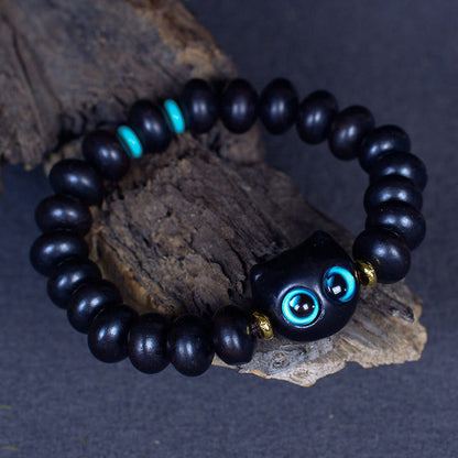 Pulsera de equilibrio de paz con forma de gato encantador de madera de ébano y cristal de Liuli Mythstone 