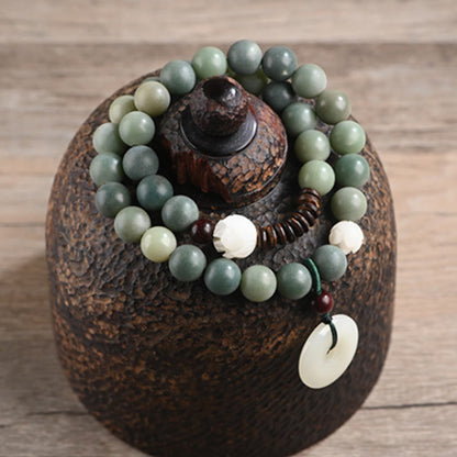 Pulsera de doble vuelta con hebilla de paz y sabiduría, semilla de bodhi, loto y jade cian