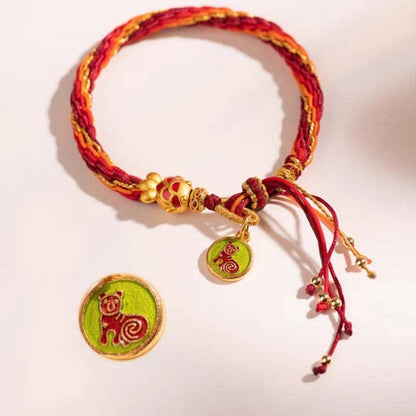 Pulsera trenzada con nudo de reencarnación y protección de peces koi hecha a mano con el zodíaco chino Mythstone