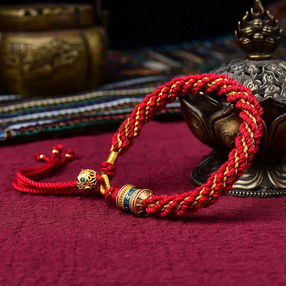 Pulsera de hilo tejido con amuleto de la suerte Thangka tibetano Mythstone hecha a mano