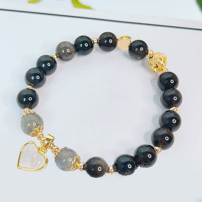 Pulsera de protección con forma de corazón, estrella y flor de obsidiana con brillo de plata natural Mythstone